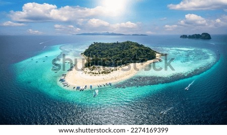 Aerial view of the beautiful Bamboo Island (Koh Mai Phai) with turquoise sea, coral reef and fine sandy beaches, Thailand
