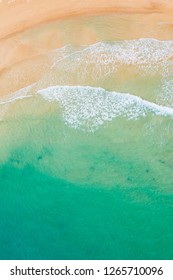 Aerial view of beautiful beach and ocean waves
