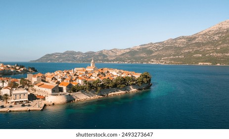 Aerial view of beautiful coastal town of Korcula Croatia overlooking the Adriatic Sea, Yacht charter, luxury yachting, holidays in Croatia - Powered by Shutterstock