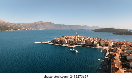 Aerial view of beautiful coastal town of Korcula Croatia overlooking the Adriatic Sea, Yacht charter, luxury yachting, holidays in Croatia - Powered by Shutterstock