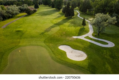 Aerial View Of A Beautiful Green Golf Course.