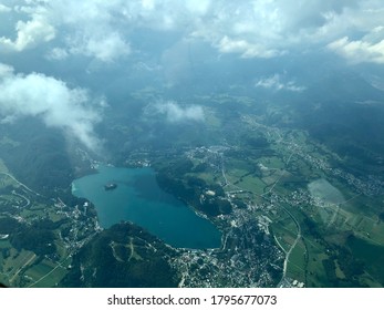 Aerial view of beautiful lake Bled in Slovenia with small island and light clouds