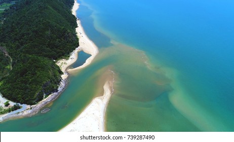 Aerial View. Beautiful Landscape Created By A Meeting Point Between River And Ocean.