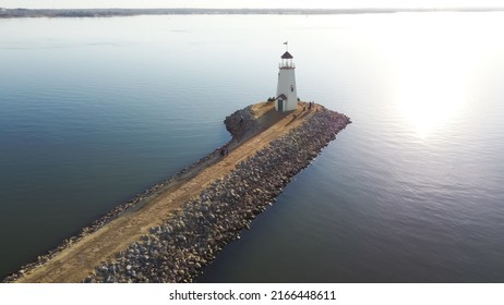 Aerial View Beautiful Lighthouse And Lake Hefner In Horizontal Line, Oklahoma City, America. Sunset At 36 Feet Tall Building Inspired By A 1700s New England Lighthouse