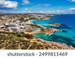 Aerial view of beautiful Nissi beach in Ayia Napa, Cyprus. Nissi beach in Ayia Napa famous tourist beach in Cyprus. A view of a azzure water and Nissi beach in Aiya Napa, Cyprus.