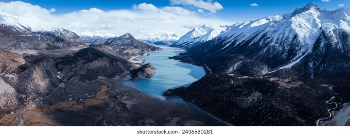 Aerial view of beautiful snow mountains and lake in Tibet,China - Powered by Shutterstock