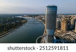 Aerial view of Belgrade, capital of Serbia. Drone view of the skyscrapers at the sunset Belgrade waterfront and skyline towers. View at Belgrade Waterfront buildings and Sava river.