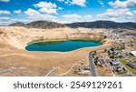 Aerial view of Berkeley Pit, in Butte, Montana. The Berkeley Pit is a former open-pit copper mine in Butte, Montana that is now a toxic lake.