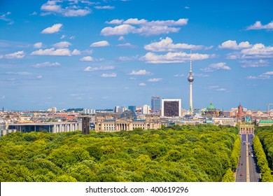 Aerial view of Berlin skyline panorama with Grosser Tiergarten public park on a sunny day with blue sky and clouds in summer seen from Berlin Victory Column (Berliner Siegessaeule), Germany