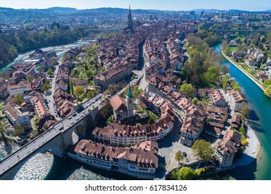 Aerial view of the Bern old town with the Aare river flowing around the town on a sunny day, Bern, Switzerland.