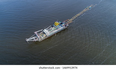 Aerial View Of Big Fishing Trawler Boat In Ocean  With Two Small Boats , Drone Shot , 