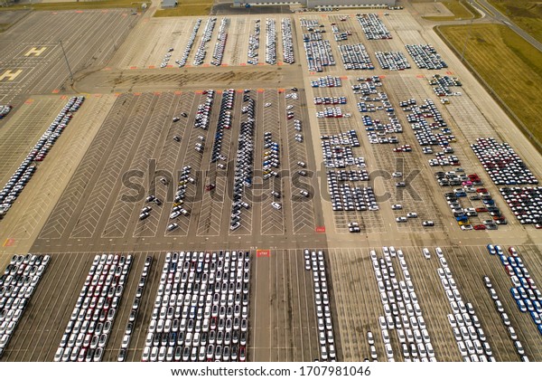 aerial view of big parking lot of\
new cars from car factory in slovakia , kia, zilina,\
08.03.2020