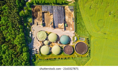 Aerial View Of Biogas Plant Near Farm In Countryside. Ecological Renewable Energy Production From Agricultural Waste. New Green Modern Agriculture In Strizov, Czech Republic, European Union. 