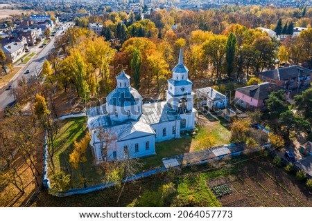 Aerial view to Blagoveschenskaya (Annunciation) Orthodox Church (Blahovishchensʹka Tserkva
) in Trostyanets, Sumy oblast, Ukraine. Autumn cityscape at sunny day