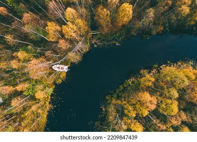 Aerial View Of Blue Winding River And Fall Forest With Autumn Colorful Trees. Beautiful Nature Landscape In Finland