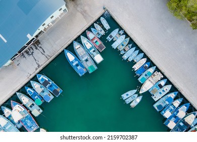 Aerial View Of Boat At Fuvahmulah Harbour, Fishing Port And Famous Dive Site For Tiger Sharks, Fuvahmulah Island South Maldives. Nautical Vessel For Marine Tourism And Scuba Diving Industry.