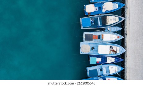 Aerial view of boat at Fuvahmulah Harbour, fishing port and famous dive site for tiger sharks, Fuvahmulah Island South Maldives. Nautical Vessel for marine tourism and scuba diving industry. - Powered by Shutterstock