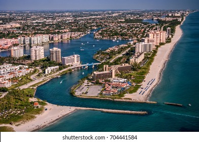 aerial view of boating inlet from atlantic ocean to intracoastal waterway at boca raton florida community