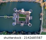 Aerial view of Bodiam Castle, 14th-century medieval fortress with moat and soaring towers in Robertsbridge, East Sussex, England.