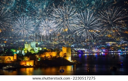 Aerial view of Bodrum resort town on Turkish Riviera at night with fireworks - Bodrum, Turkey