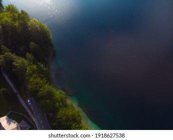 Aerial view of the Bohinj lake. Travel and tours concept. Beautiful landscape ot the Triglav mountains, national park, summer forest and the church (Cerkev sv. Duha, Ribcev Laz), Slovenia, Europe - Shutterstock ID 1918627538