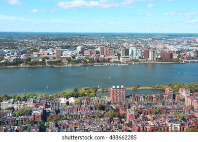 Aerial view of Boston skyline and Cambridge district separated by Charles River.