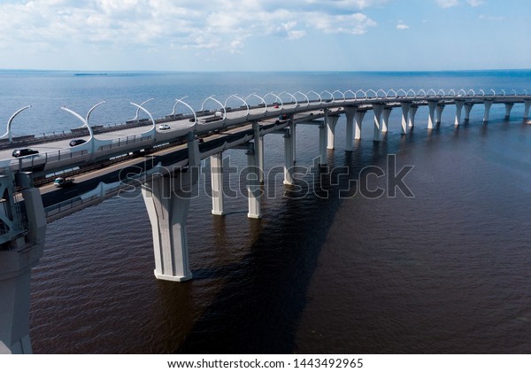 Aerial View of the bridge with cars through the\
high-speed way. Highway road line. Highway. ZSD,Western High Speed\
Diameter