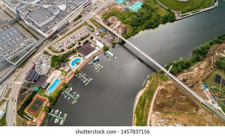 Aerial View Bridge. Moscow, Russia 06/2019: Merry Go Round In Vegas Trade Center. Ferris Wheel Myakinino, Krasnogorsk City. Pavshinskaya Poima. Musement Park, Urban Landscape Carousel. Pool