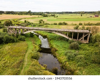 Aerial view of bridge to nowhere. An old bridge in Grenci, Latvia never getting ready.