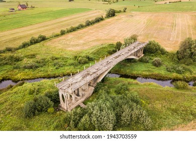 Aerial view of bridge to nowhere. An old bridge in Grenci, Latvia never getting ready.