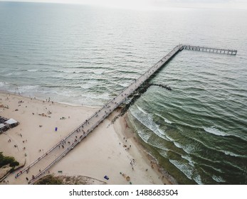 Aerial view of bridge of Palanga, a very popular holiday destination in Lithuania, with sand beach and Baltic sea.