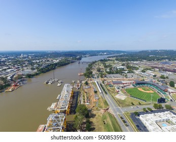 Aerial view Broadway Bridge construction in progress at the north bank of Arkansas river in Little Rock, Arkansas, US. Working crane and metal structure for construction background. - Shutterstock ID 500853592