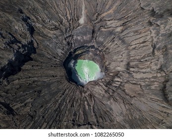 Aerial view of Bromo mountain active volcano crater in Bromo Tengger Semeru National Park, East Java, Indonesia. The most famous tourist attraction. Top view from drone - Powered by Shutterstock