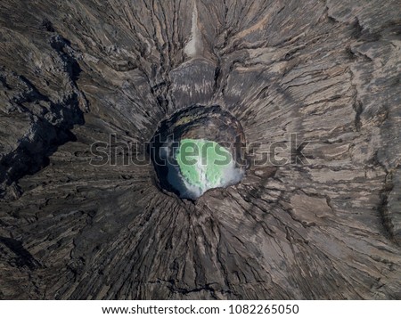 Aerial view of Bromo mountain active volcano crater in Bromo Tengger Semeru National Park, East Java, Indonesia. The most famous tourist attraction. Top view from drone