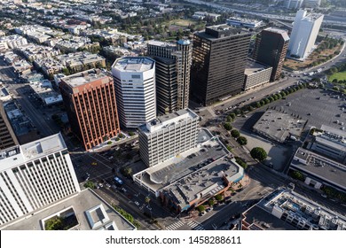 Aerial view of buildings along Wilshire Blvd near Westwood and the 405 freeway in Los Angeles, California.