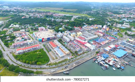 An Aerial View Of Buildings And Sea Of Lahad Datu, Sabah. Borneo. Lahad Datu District In Capital Of The Tawau Division, Sabah. The Town Is Surrounded By Stretches Of Cocoa And Palm Oil Plantations.