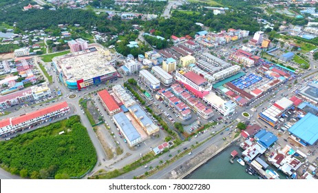 An Aerial View Of Buildings And Sea Of Lahad Datu, Sabah. Borneo. Lahad Datu District In Capital Of The Tawau Division, Sabah. The Town Is Surrounded By Stretches Of Cocoa And Palm Oil Plantations.