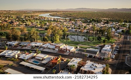 An aerial view of Bullhead City with the Colorado River flowing in the background
