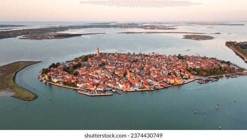 Aerial view of Burano Island at sunset golden hour, Venice, Italy - Powered by Shutterstock