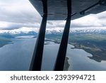 Aerial view from bush plane of Lake Iliamna with islands, Aleutian mountain range. Near Pedro Bay, Alaska. Aerial view from bush plane. 