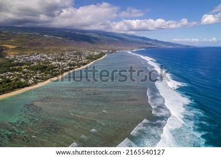 Aerial view by drone of La plage de l'Hermitage, a white sand beach, it is located between Saint-Gilles-les-Bains and La Saline, Reunion Island