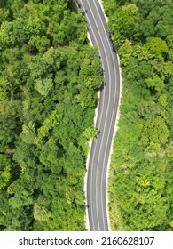 Aerial View By Drone Top Angle Rain Forest Road From High Mountain Pass 