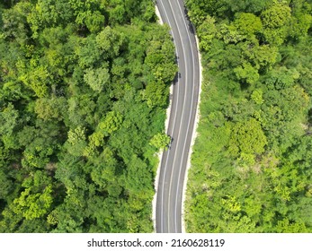 Aerial View By Drone Top Angle Rain Forest Road From High Mountain Pass 