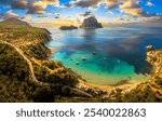 Aerial view of Cala d’Hort beach in Ibiza, featuring the iconic Es Vedrà rock, turquoise waters, and scenic Mediterranean coastline.