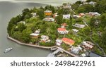 Aerial view of Caleta Tortel village in the south of Chile, Aysen Region. This coastal village is located between the mouth of the Baker River and a small embayment of the Baker.