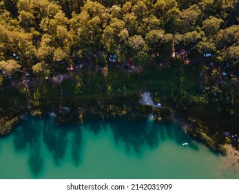 Aerial View Of Camp Site Near Lake In Forest Copy Space