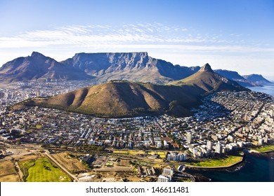 Aerial view of Cape Town, with Green Point and Sea Point, Table Mountain, Lion's Head, Signal Hill and Devil's Peak.