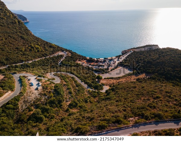 aerial view of car moving by road at Lefkada island\
Greece near ionian sea