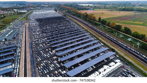 Aerial View Of A Car Park With Solar Panels