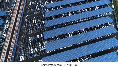 Aerial View Of A Car Park With Solar Panels